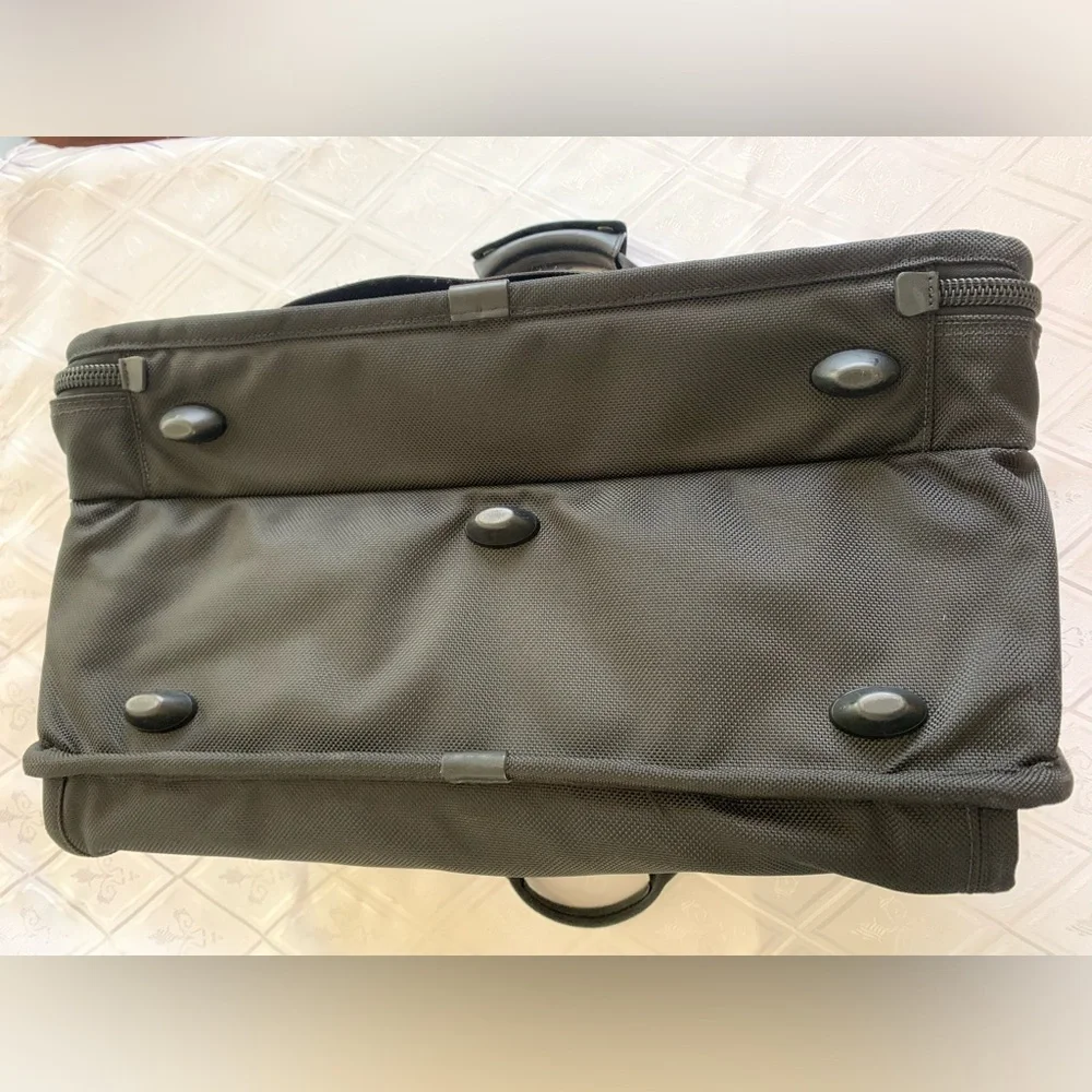 Tumi Black Travel Bag with Adjustable Strap